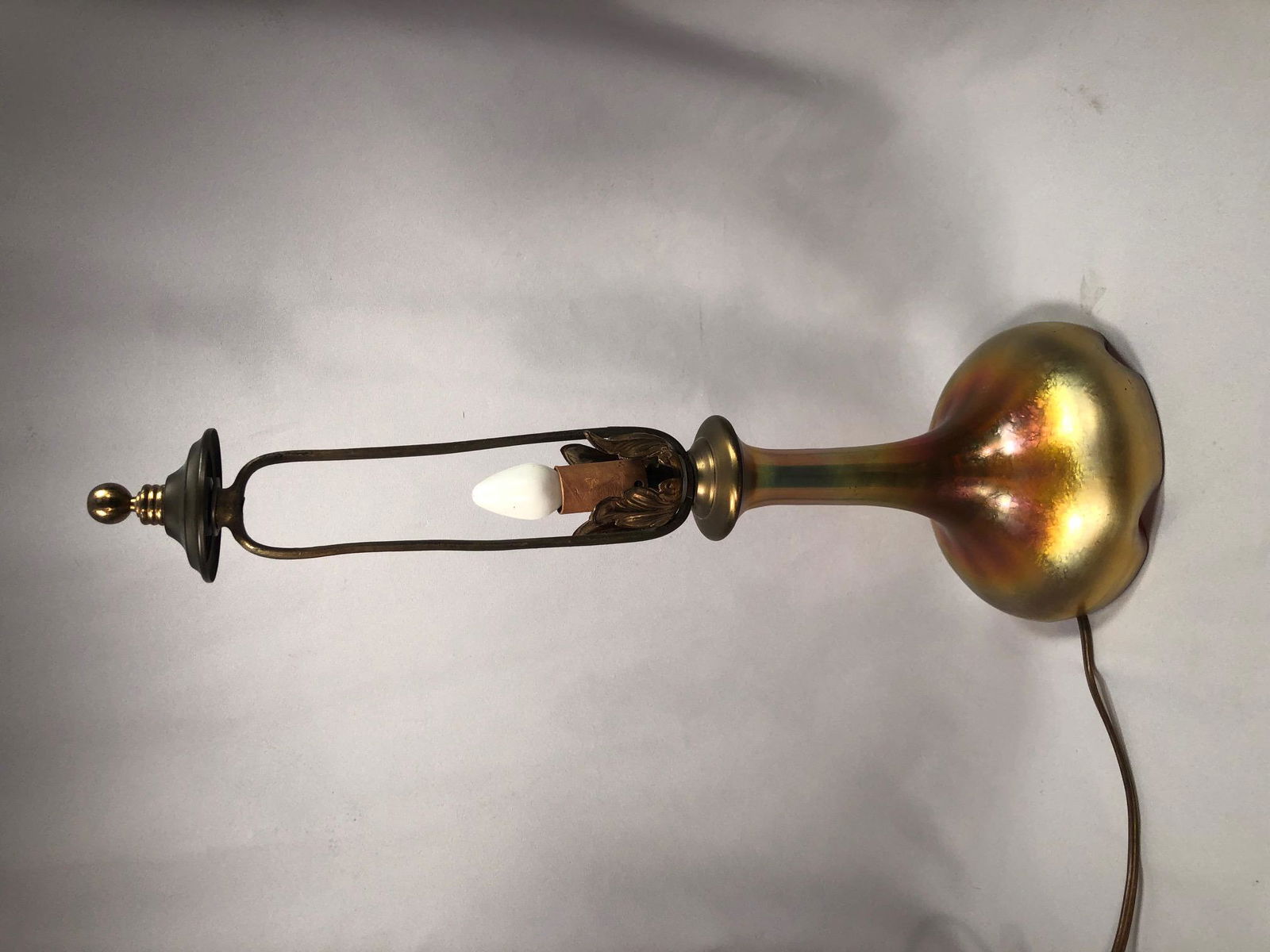 Antique Carder Steuben Gold Aurene Glass Lamp Base: Antique Carder Steuben Gold Aurene Glass Lamp Base Shade Base Style 915 The lamp is in excellent condition light is in working order. The glass has stunning colors glass portion meaures 7" high b