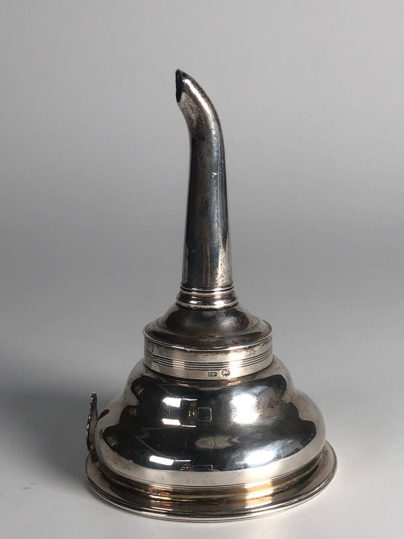 Georgian English Sterling Silver Wine Funnel: Georgian English Sterling Silver Wine FunnelEnglish sterling Georgian wine funnel has a crest with a lion on it, Measures 5 1/8Â” by 3 ¼Â”