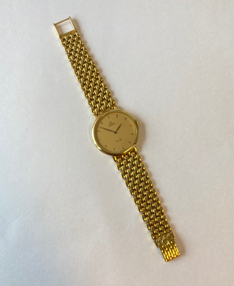 Omega 18k Gold 'De Ville' Wristwatch: Omega 18k Gold 'De Ville' WristwatchTotal length: 7 1/4"Total Weight: 2.4 troy ounces marked on rear and buckle