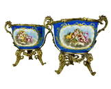 A PAIR OF FRENCH ORMOLU MOUNTED SEVRES-STYLE VASES