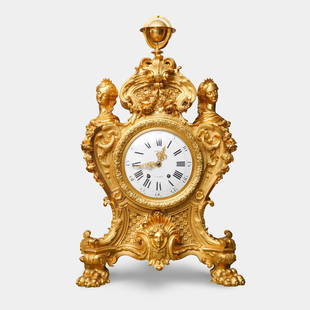 A MONUMENTAL FRENCH ORMOLU BRONZE MANTEL CLOCK BY MAISON MARQUIS: A MONUMENTAL FRENCH ORMOLU BRONZE MANTEL CLOCK BY MAISON MARQUIS, Dimensions:Height: 38.5" (98 cm)Width: 23" (58 cm)Depth: 11.5" (29 cm)