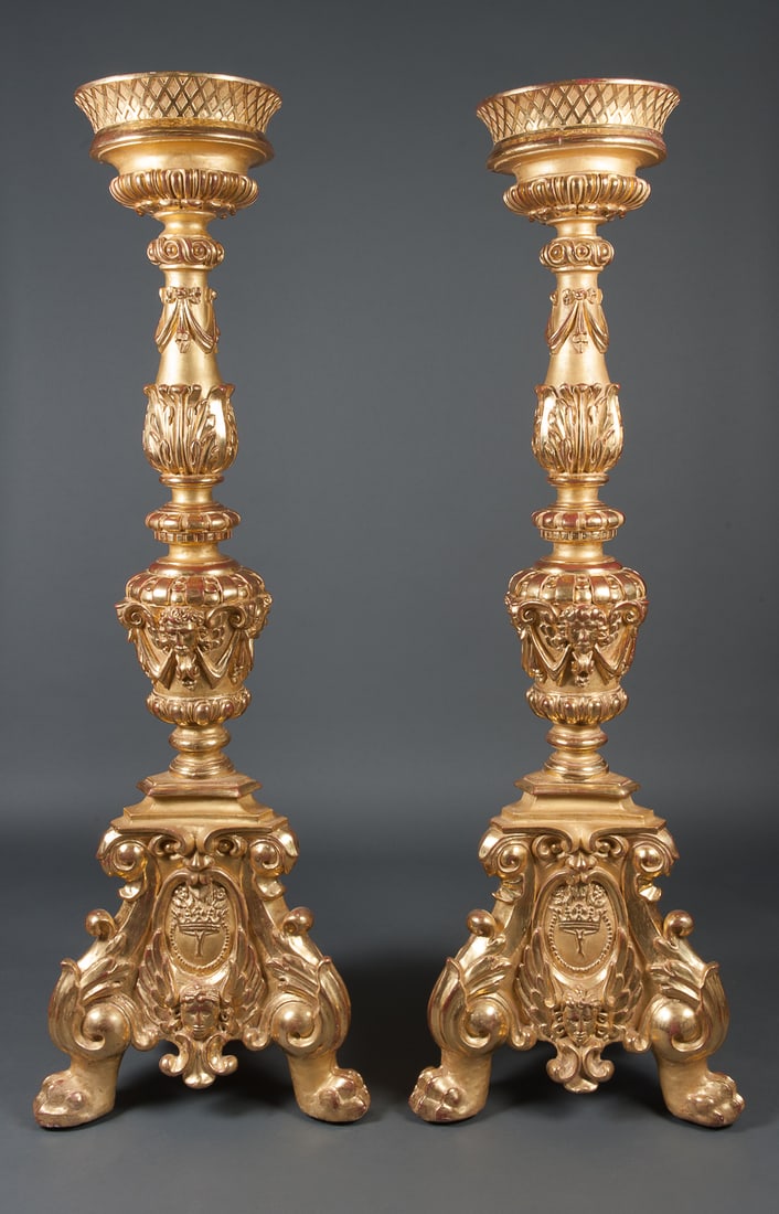 A PAIR OF ITALIAN GILT-WOOD TORCHERS, CIRCA 1870: A PAIR OF ITALIAN GILT-WOOD TORCHERS, Circa 1870, each carved with a circular top on triform bases, Dimensions Height: 82.5" Width: 28.5"