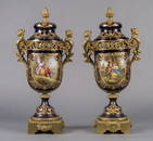 PAIR OF FRENCH SEVRES STYLE PORCELAIN AND GILT BRONZE MOUNTED LIDDED VASES, 19TH CENTURY