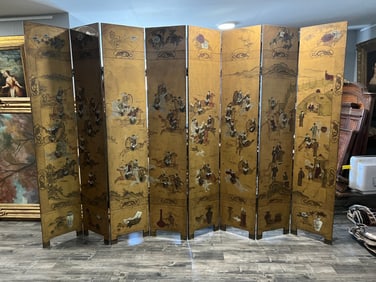 A JAPANESE EIGHT PANEL HAND PAINTED FOLDING FLOOR SCREEN