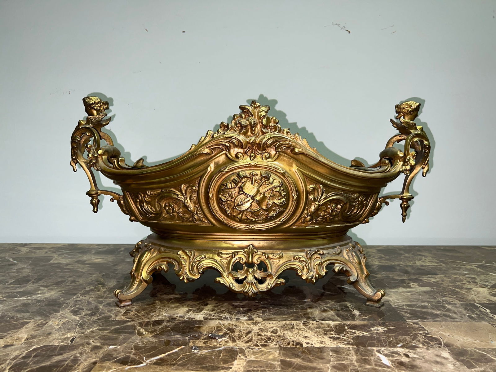 A FRENCH LOUIS XV STYLE GILT BRONZE MOUNTED AND SEVRES STYLE PORCELAIN CENTERPIECE, LATE 19TH