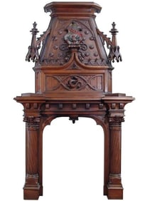 A MONUMENTAL ENGLISH GOTHIC STYLE CARVED WALNUT FIREPLACE, Late 19th Century
