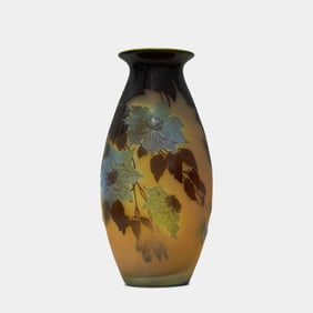 A Large Emile Galle cameo glass vase, yellow ground acid etched overlaid with clematis