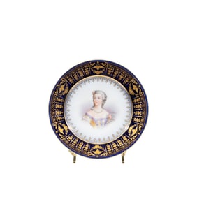 A FRENCH SEVRES STYLE PORCELAIN PAINTED PORTRAIT PLATE
