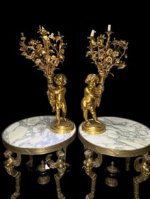 A MONUMENTAL PAIR OF FRENCH ORMOLU AND PATINATED-BRONZE SEVEN-LIGHT CANDELABRA, LATE QUARTER 19TH