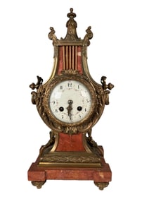 A FRENCH ORMOLU MOUNTED MARBLE MANTEL CLOCK, EARLY 20TH CENTURY