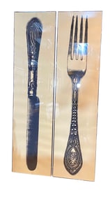 A LARGE PAIR OF KNIFE AND FORK PRINTS IN LUCITE FRAMES, FROM THE ESTATE OF OZZY OSBORNE