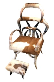A TEXAS LONG HORN CHAIR AND OTTOMAN, CIRCA 1950,