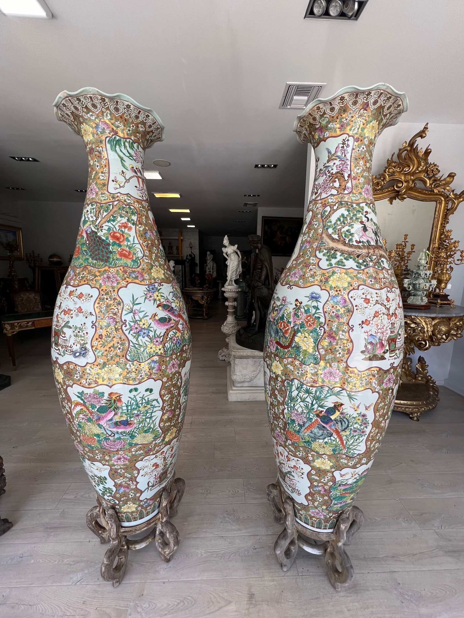 A MONUMENTAL PAIROF CHINESE FAMILLE ROSE PALACE VASES 84" TALL: A MONUMENTAL PAIROF CHINESE FAMILLE ROSE PALACE VASES, HEIGHT: 84"