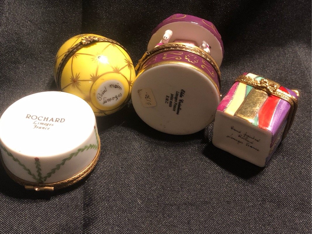 Limoges France trinket boxes Rochard Elda: egg, snowman, carousel, present gift box. There are no chips on them.