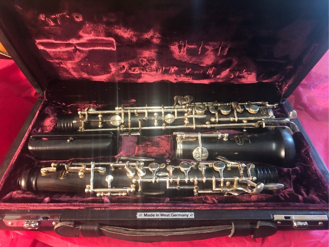Buffet Crampon Cie A Paris Oboe: Beautiful rich, dark wood oboe in case, looks like it was barely used. 8775 serial number. Also comes with a case to protect the harder case.