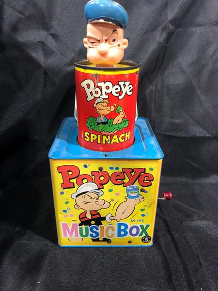 Popeye Jack in The Music Box Vintage Toy: Neat old toy being sold as is. Does not pop open freely, no sound. Pipe is missing. Box itself is in good condition for age. Will display nicely on a shelf.