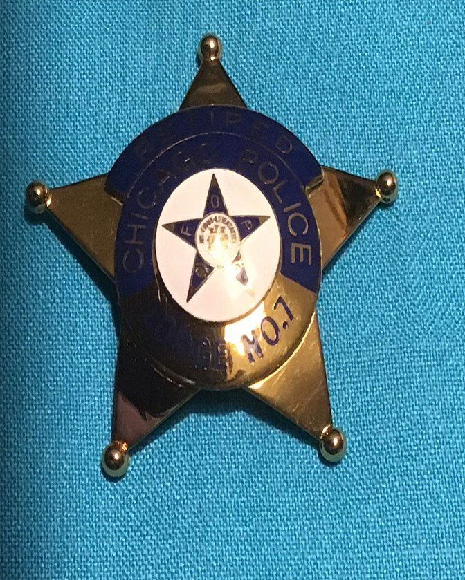 vtg enamel obsolete retired Chicago Police Lodge badge: vintage enamel obsolete retired Chicago Police Lodge 7 badgeGold plated and enamel 5 point star badge in pristine conditon. Measures approx 2 7/8" in diameter. The front reads, "RETIRED, CHICAGO POLIC