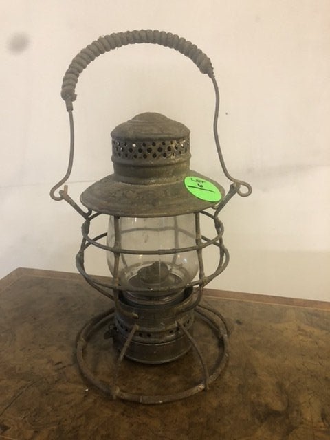 ICRR Railrod Lantern Handlan: cool old railroad lantern with plate on it reads, ww486. Has unusal handle with a roping on it. Has rust and dings but still nice one for the collector. Approx 10" tall without handle