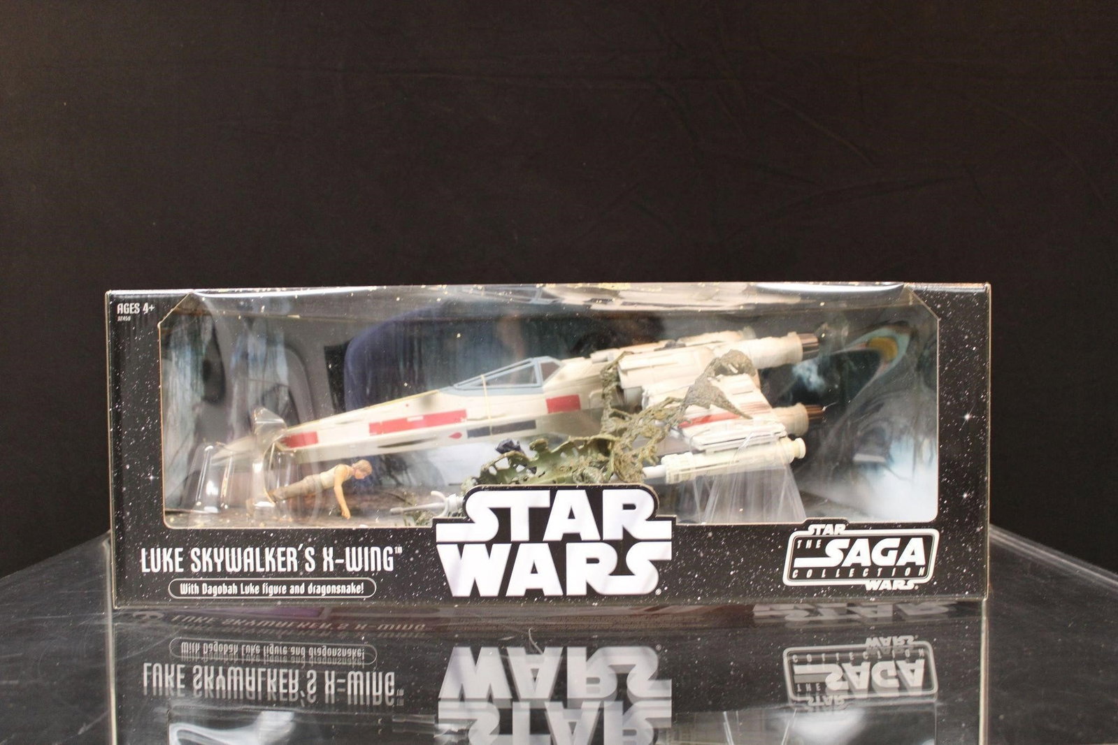 Skywalker X- Wing w/ Dagobah Luke figure: This is a 2006 Star Wars Saga Collection Luke Skywalker's X-Wing with Dagobah Luke figure and dragon-snake. The Luke Skywalker's X-Wing with Dagobah Luke figure and dragon-snake is a popular item from