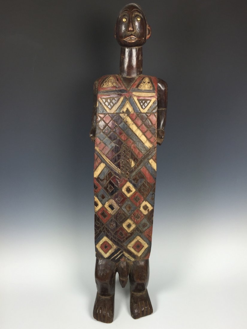 Tanzania Coffin Box Statue: African Art Tanzania Statue, dimension is 25.5 inches high x 6.25 inches wide. The shipping cost for domestic is $55.00 flat rate shipping within the Continental US, international foreign shipping rat