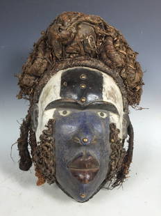 Bacongo Fetish Mask: African Art Bacongo Fetish Mask from DRC, dimension is 12 inches high x 7 inches wide. The shipping cost for domestic is $50.00 flat rate shipping within the Continental US, international foreign