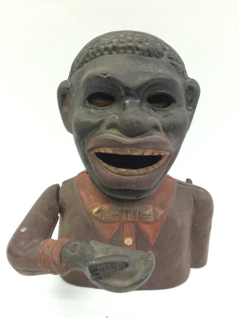 Cast Iron Bank: Cast Iron Bank, The dimension is 5 inches high x 4 inches wide. The shipping cost for domestic is $35.00 flat rate shipping within the Continental US, the International foreign shipping rates are dete