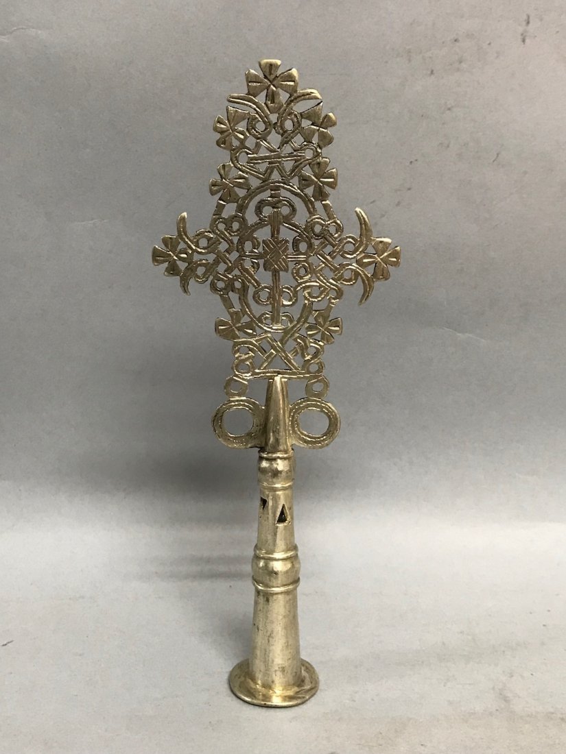 Ethiopian Coptic Prcocessional Cross: African Art Ethiopian Coptic Cross is from Ethiopia. The dimension is 9.75 inches high x 3.75 inches wide. The shipping cost for domestic is $40.00 flat rate shipping within the Continental US, the In