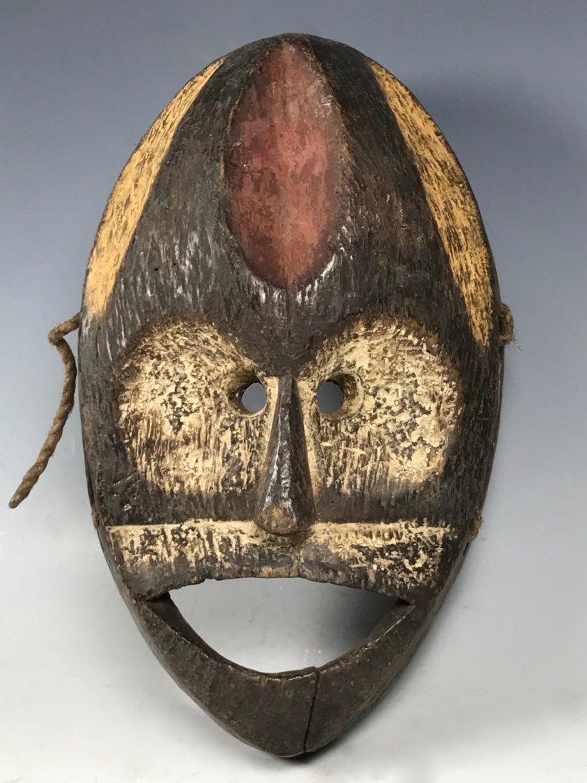 Boa Mask: African Art Boa Mask is from DR Congo. The dimension is 10 inches high x 6.25 inches wide. The packing and shipping cost with insurance for domestic is $35.00 flat rate shipping within the Continental