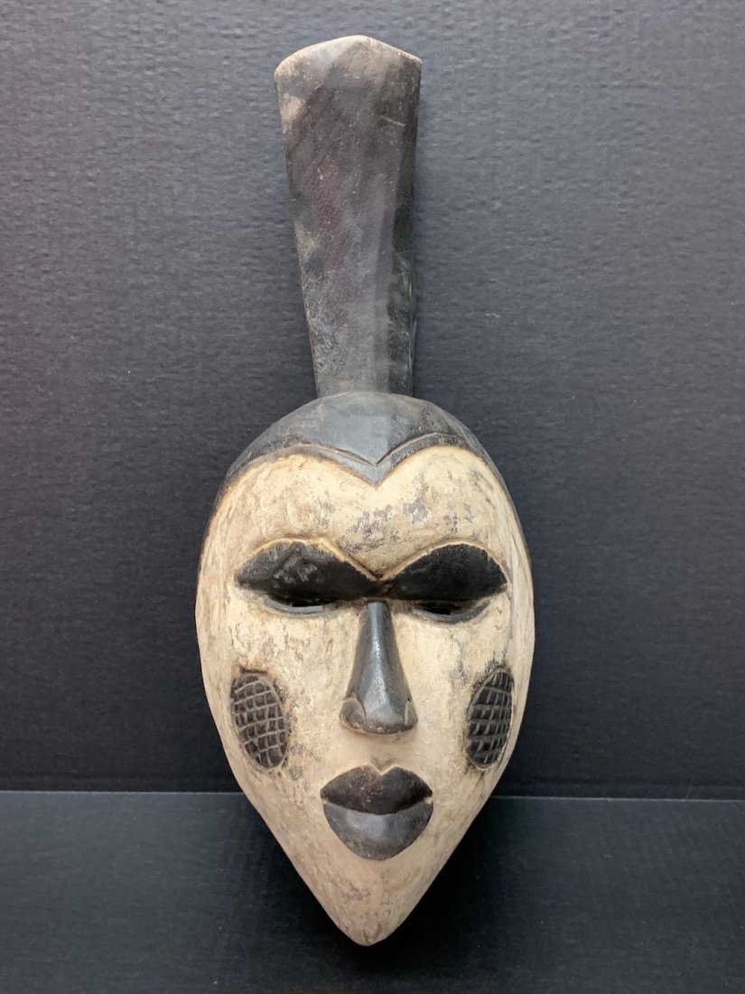 Yoruba Mask: African Art Yoruba Mask is from Nigeria. The dimension is 20 inches high x 8.25 inches wide. The shipping cost for domestic is $45.00 flat rate shipping within the Continental US, the International fo