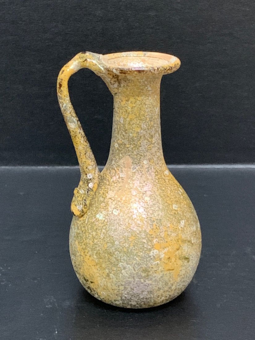 Roman Glass Bottle: Roman Glass Bottle. The dimension is 4 inches high x 2 inches wide. The shipping cost for domestic is $25.00 flat rate shipping within the Continental US, the International foreign shipping rates are 