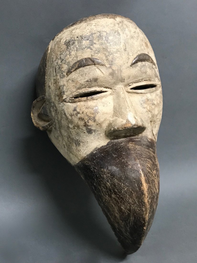 Ibo Mask: African Art Ibo Mask from Nigeria. The dimension 12.5 inches high x 8.5 inches wide. The packing and shipping cost with insurance for domestic is $40.00 flat rate shipping within the Continental US, t