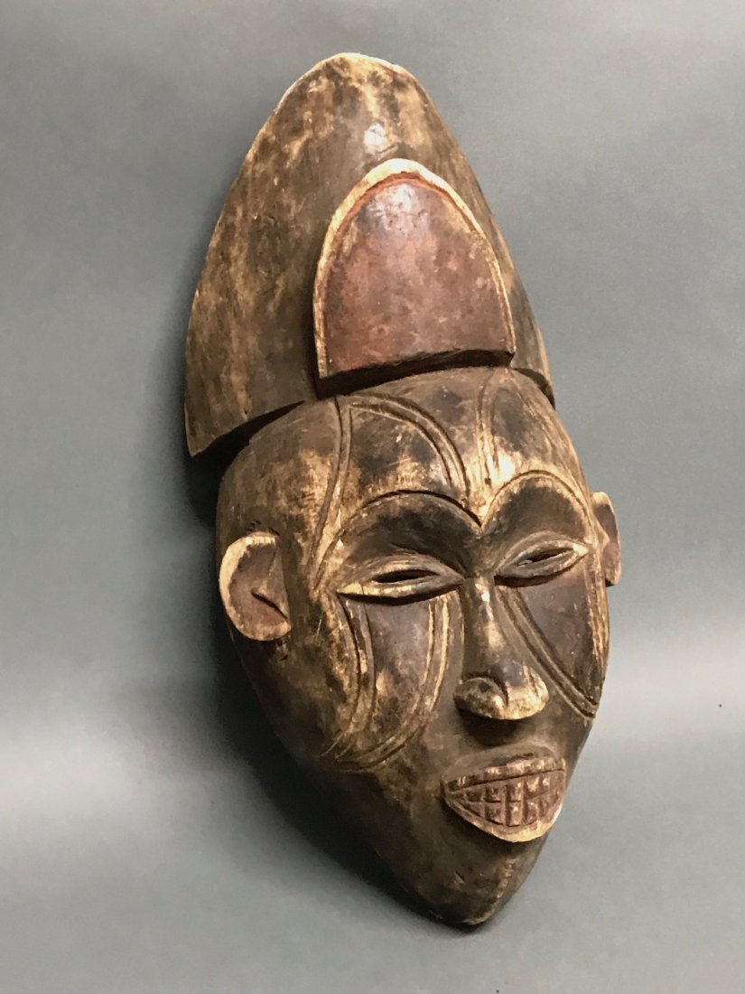 Ibo Mask: African Art Ibo Mask from Nigeria. The dimension 14 inches high x 7.25 inches wide. The packing and shipping cost with insurance for domestic is $35.00 flat rate shipping within the Continental US, th