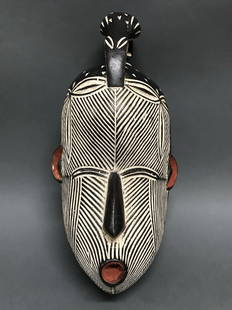 Songye Mask: African Art Songye Mask from Congo. The dimension 12 inches high x 6 inches wide. The packing and shipping cost with insurance for domestic is $40.00 flat rate shipping within the Continental US, the