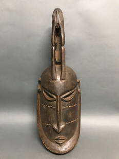 Dogon Mask: African Art Dogon Mask from Mali. The dimension 21 inches high x 7.5 inches wide. The packing and shipping cost with insurance for domestic is $45.00 flat rate shipping within the Continental US, the