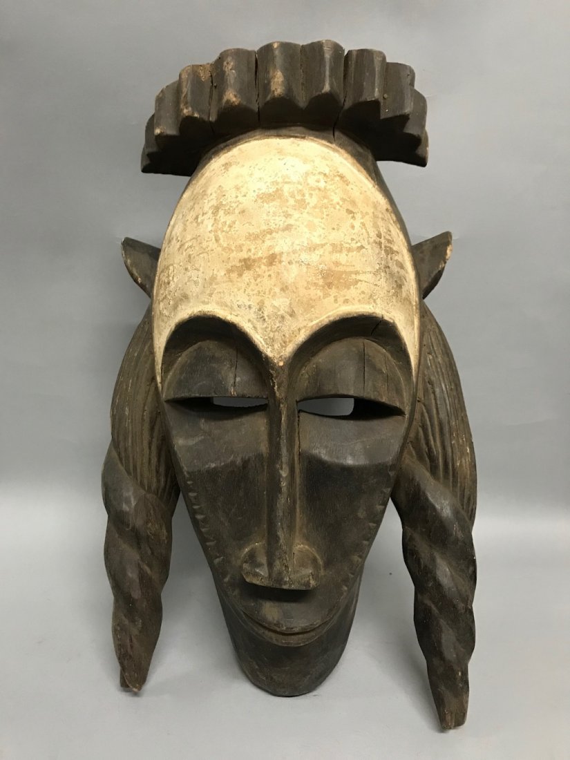 Ibo Mask: African Art Ibo Mask from Nigeria. The dimension is 16 inches high x 10 inches wide. The packing and shipping cost with insurance for domestic is $45.00 flat rate shipping within the Continental US, t