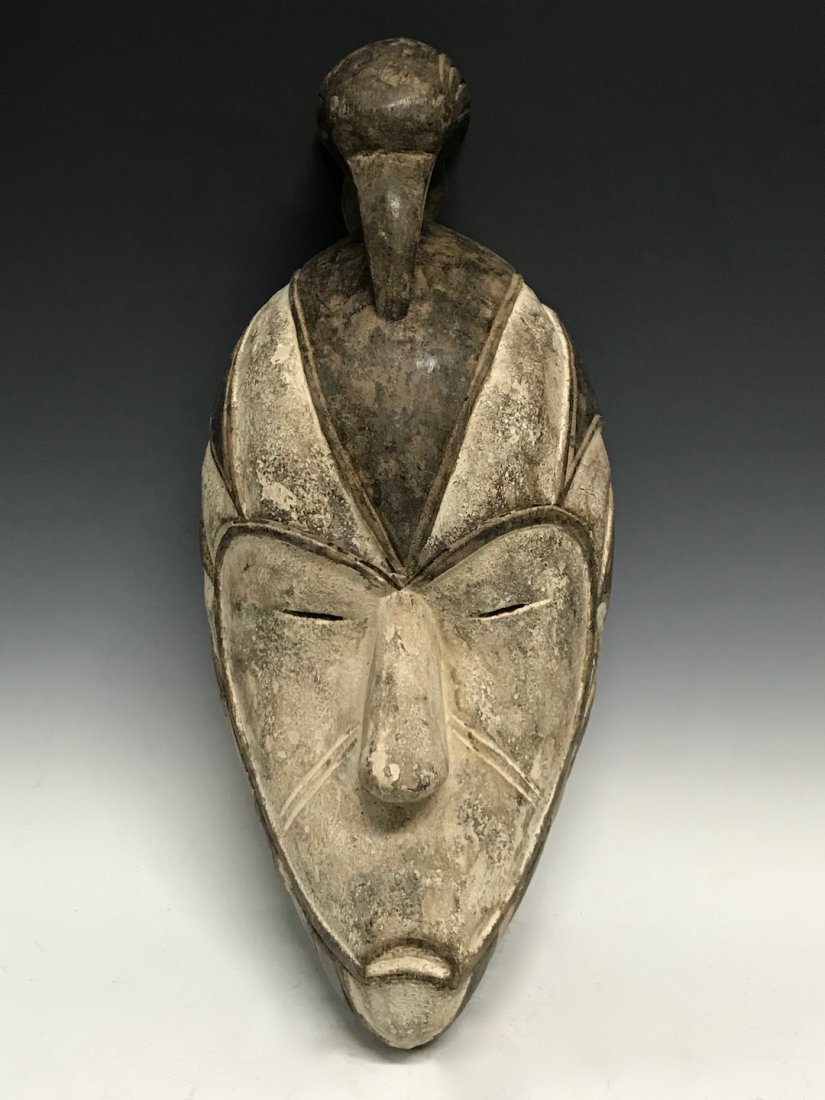 Ibo Mask: African Art Ibo Mask from Nigeria. The dimension 17 inches high x 7.5 inches wide. The packing and shipping cost with insurance for domestic is $35.00 flat rate shipping within the Continental US, the