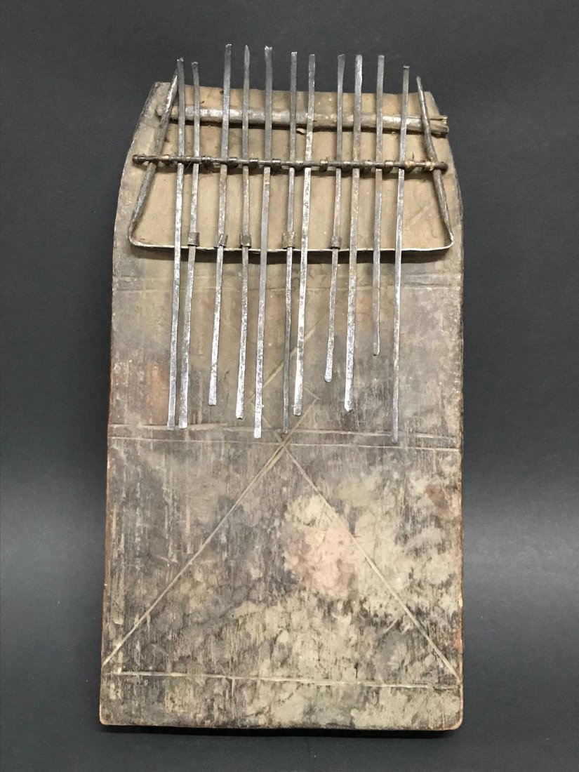 Kalimba Finger Piano: Kalimba Finger Piano, Angola Dimension 11 inches high x 6 inches wide. The shipping cost for domestic is $30.00 flat rate shipping within the Continental US, international foreign shipping rates are d