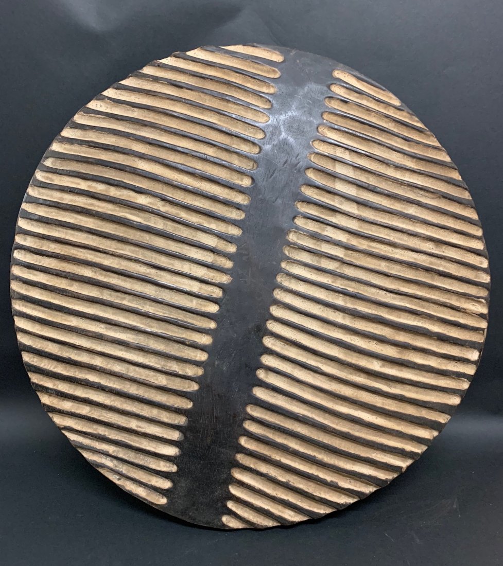 Zulu Round Shield: Zulu Round Shield. The dimension 19 inches high x19 inches wide. The packing and shipping cost with insurance for domestic is $45.00 flat rate shipping within the Continental US, the International for