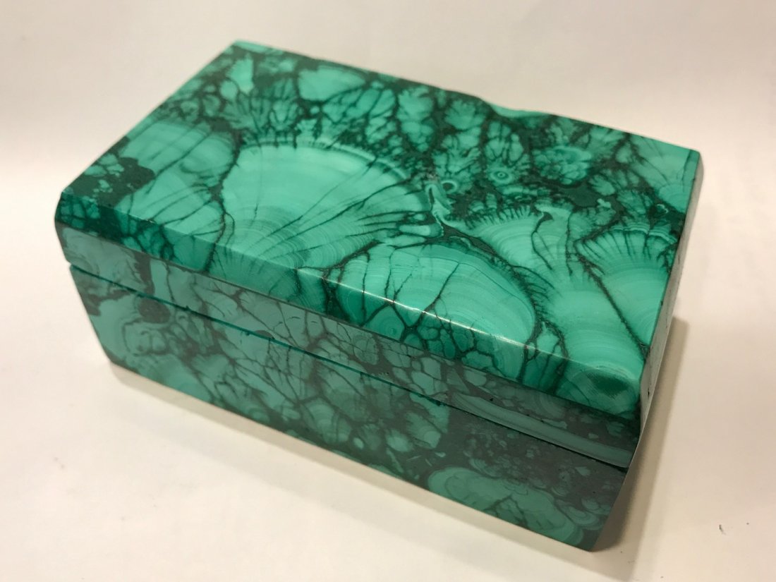 Carved Malachite Stone Jewelry Box: Carved Malachite Stone Jewelry Box. The dimension 2 inches high x 4 inches wide. The packing and shipping cost with insurance for domestic is $35.00 flat rate shipping within the Continental US, the I