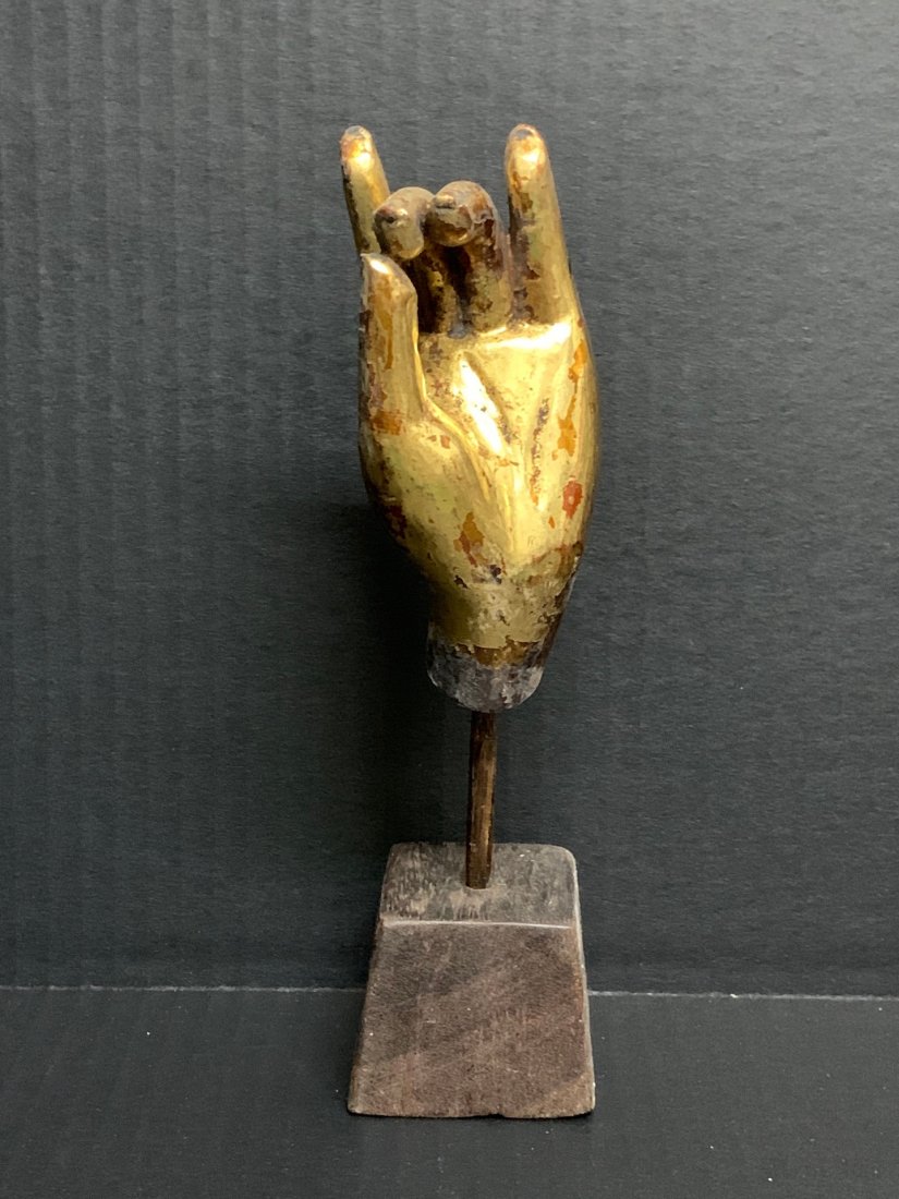 Chinese Carved Wood Gold Gilt Buddha Hand: Chinese Carved Wood Gold Gilt Buddha Hand. The dimension is 8 inches high x 2.5 inches wide. The packing and shipping cost with insurance for domestic is $25.00 flat rate shipping within the Continent
