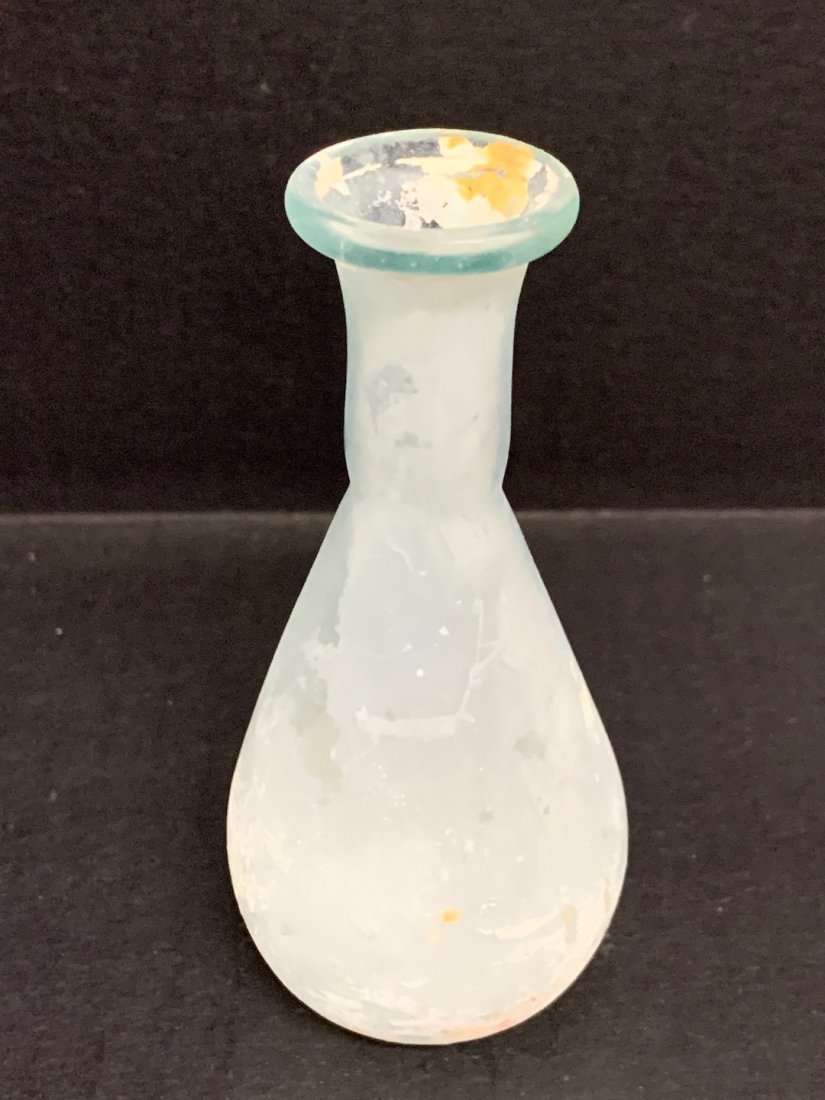 Roman Glass Bottle/Vial: Roman Glass Bottle/Vial The dimension is 4.25 inches high x 2 inches wide. The shipping cost for domestic is $15.00 flat rate shipping within the Continental US, the International foreign shipping rat