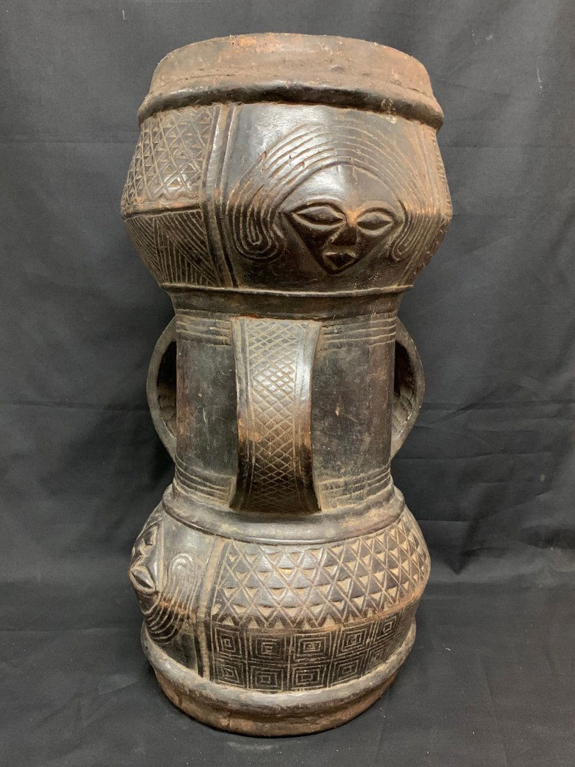Kuba Drum: African Art, Tribal Art Kuba Drum. The dimension is 20 inches high x 10 inches wide. The shipping cost for domestic is $65.00 flat rate shipping within the Continental US, the International foreign sh