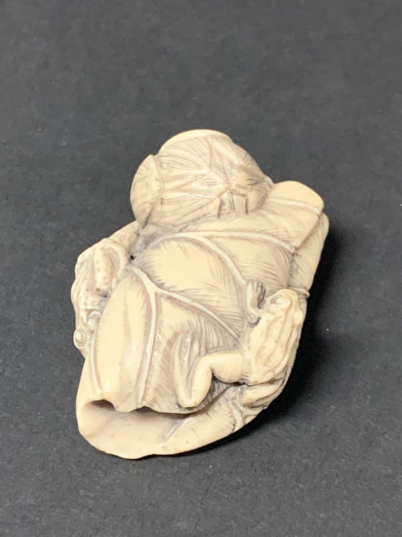 Netsuke Bone: Chinese Decorative Work of Art Netsuke Bone. The dimension is 2 inches high x 1.5 inches wide. The shipping cost for domestic is $20.00 flat rate shipping within the Continental US including handling,