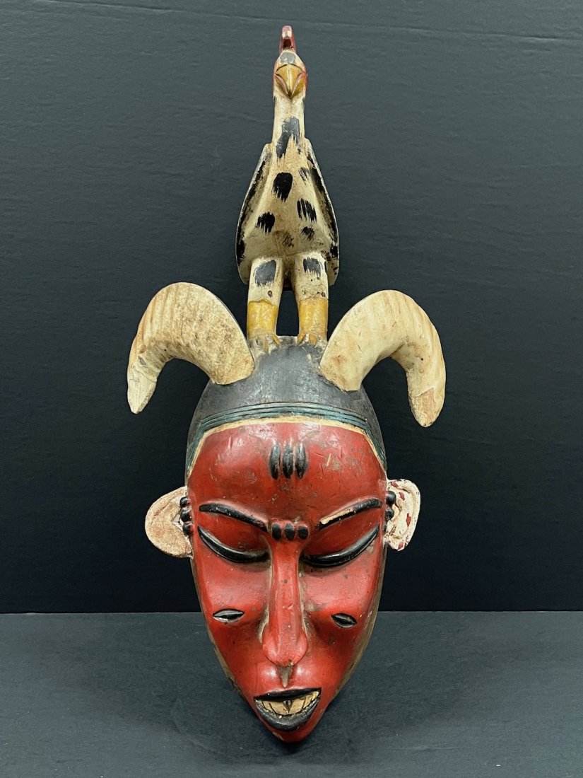 Senufo Mask: African Art Senufo Mask from Ivory Coast. The dimension is 18.5 inches high x 9.5 inches wide. The shipping cost for domestic is $45.00 flat rate shipping within the Continental US including handling,