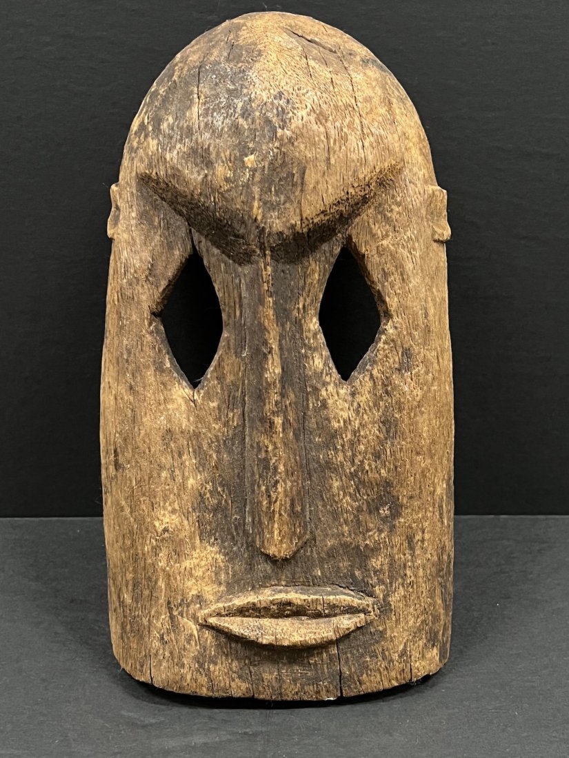 Dogon Mask: African Art Dogon Mask from Mali. The dimension is 12 inches high x 6.5 inches wide. The shipping cost for domestic is $35.00 flat rate shipping within the Continental US including handling, packing a