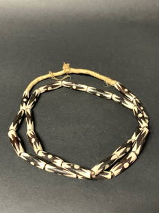 Beaded Necklace: African Tribal Art Beaded Necklace. The dimension is 30 Inches round. The shipping cost for domestic is $20.00 flat rate shipping within the Continental US including handling, packing and insurance (i