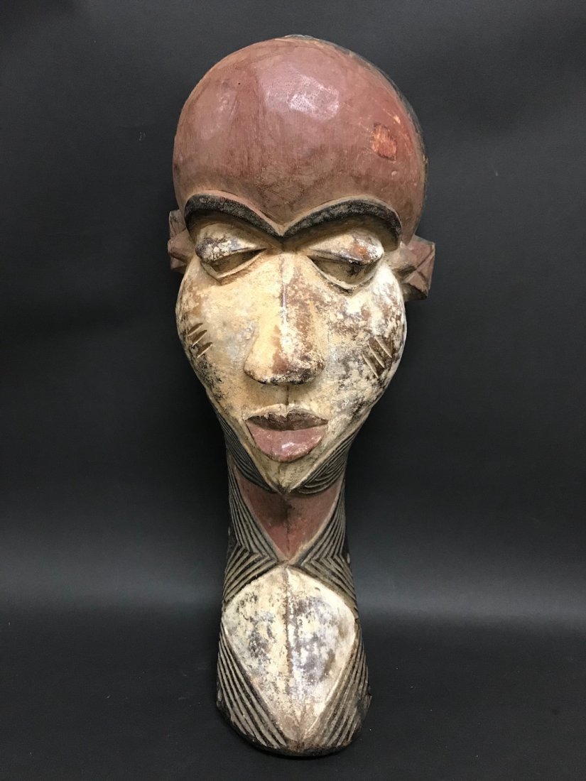 Pende Mask: African Tribal Art Pende Mask. The dimension is 19 inches high x 7 inches wide. The shipping cost for domestic is $40.00 flat rate shipping within the Continental US including handling, packing and in