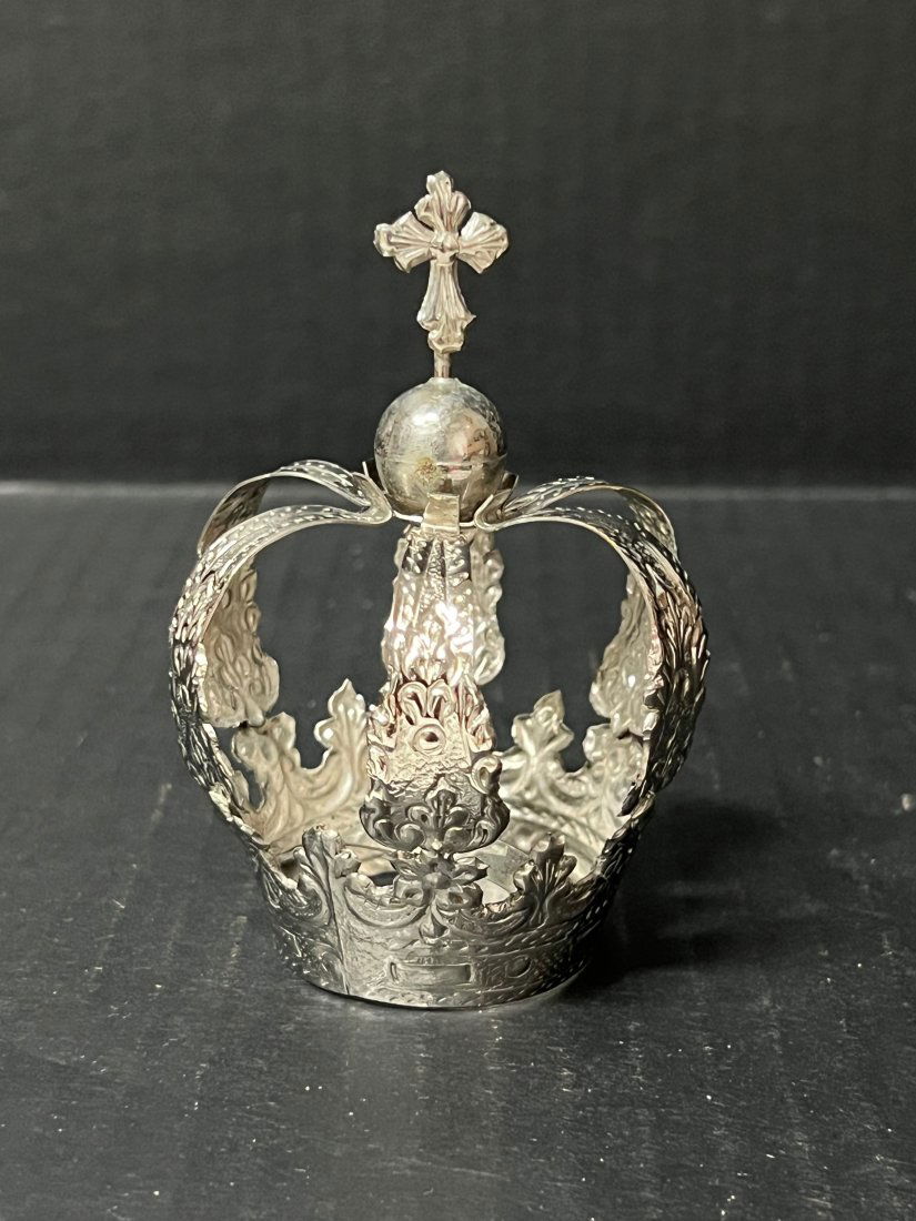 Silver Metal Gilt Crown: Religious Work of Art Carved Metal Gilt Crown. The dimension is 3.5 inches high x 3 inches wide. Opening 1.5 inches wide. The shipping cost for domestic is $25.00 flat rate shipping within the Contine