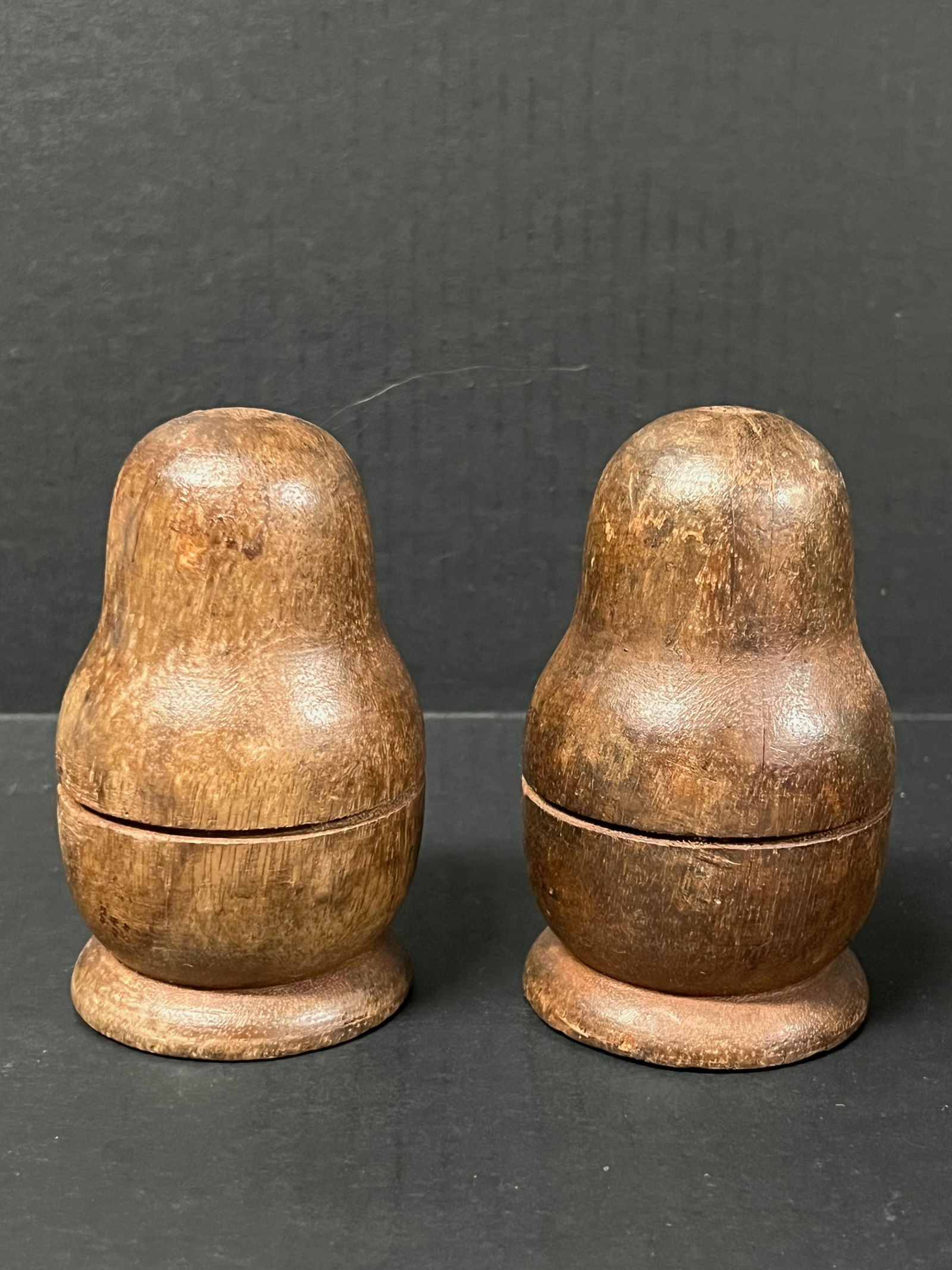 Carved Wood Nesting Doll Sculpture 2 pieces: Decorative Folk Art Papermache Mold of Nesting Doll. The dimension is 4.75 inches high x 3 inches wide. The shipping cost for domestic is $25.00 flat rate shipping within the Continental US including