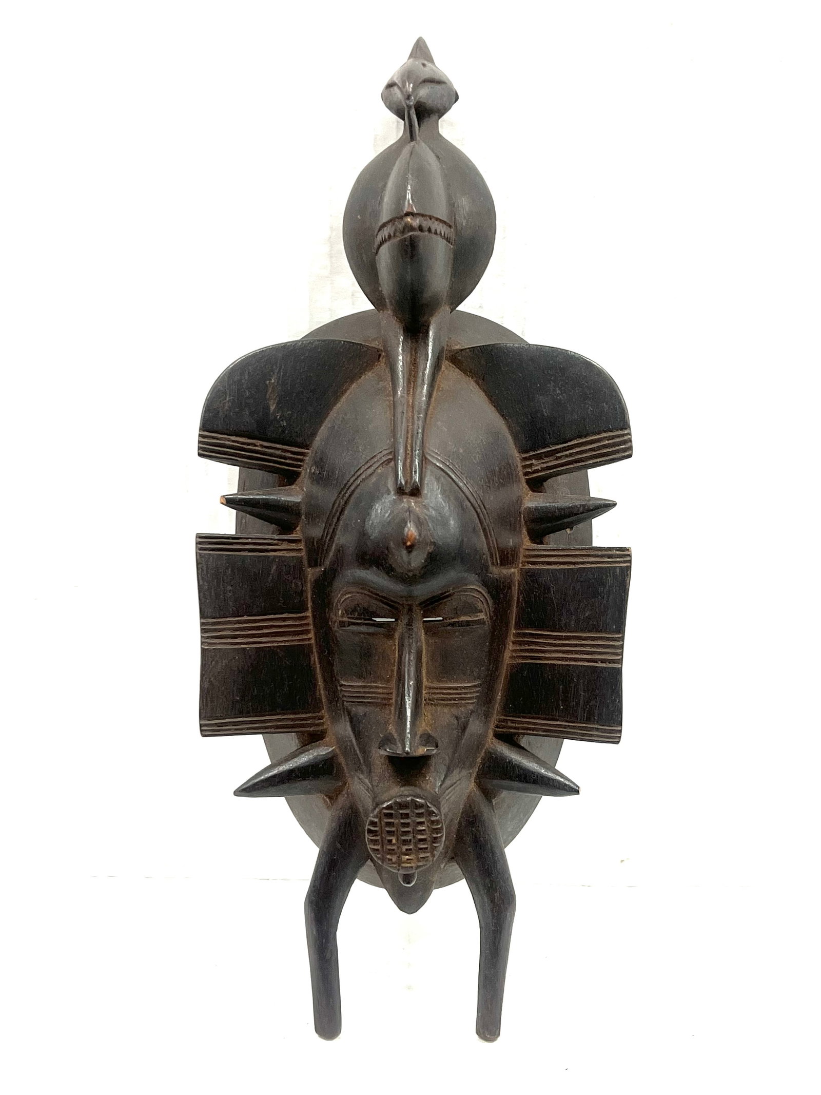 Senufo Mask: African Tribal Art Senufo Mask. The dimension is 18 inches high x 4.5 inches wide. The shipping cost for domestic is $30.00 flat rate shipping within the Continental US including handling, packing and